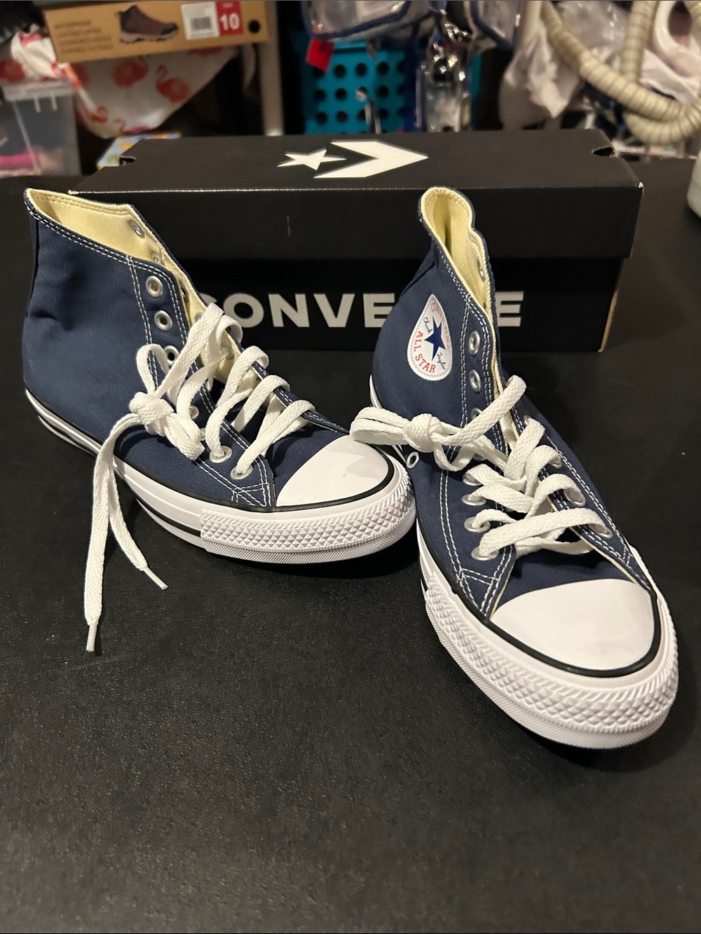 Converse women’s size 9, men’s size 7 Navy and White High Top Sneakers